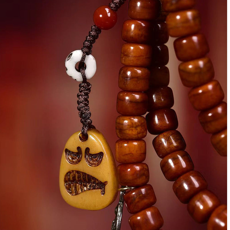 Dharma Echo Tibetan 108-Bead Yak Bone Mala with Dzi Bead & A Dai Charms