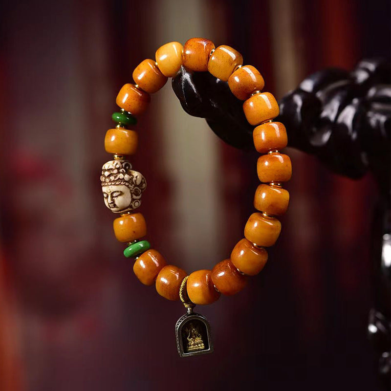 Dharma Echo Tibetan Yak Bone Barrel Bead Bracelet with Guanyin Accent