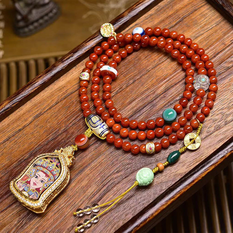 Dharma Echo Red Agate Mala Necklace with Zaki Lhamo Thangka Pendant