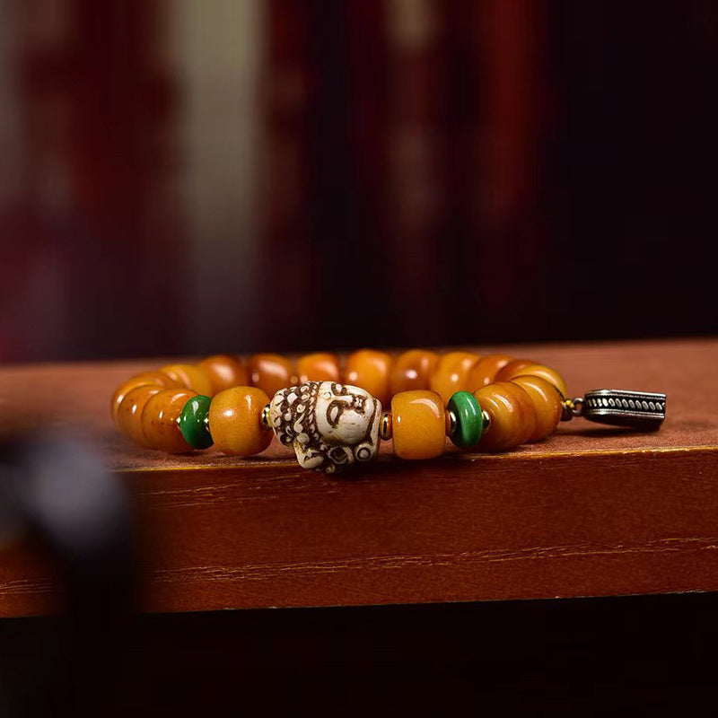 Dharma Echo Tibetan Yak Bone Barrel Bead Bracelet with Guanyin Accent
