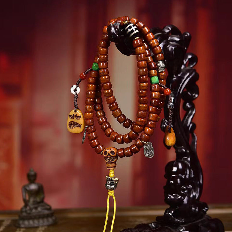 Dharma Echo Tibetan 108-Bead Yak Bone Mala with Dzi Bead & A Dai Charms
