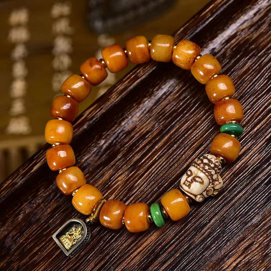 Dharma Echo Tibetan Yak Bone Barrel Bead Bracelet with Guanyin Accent