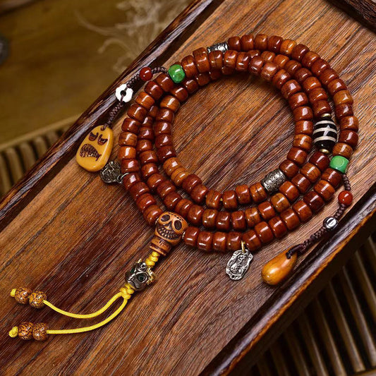 Dharma Echo Tibetan 108-Bead Yak Bone Mala with Dzi Bead & A Dai Charms